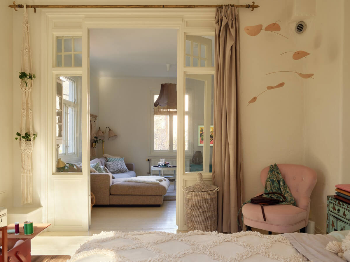 Light-Filled Rooms and a Charming Veranda in a Swedish Apartment 22 bedroom-glass-doors-with-curtains