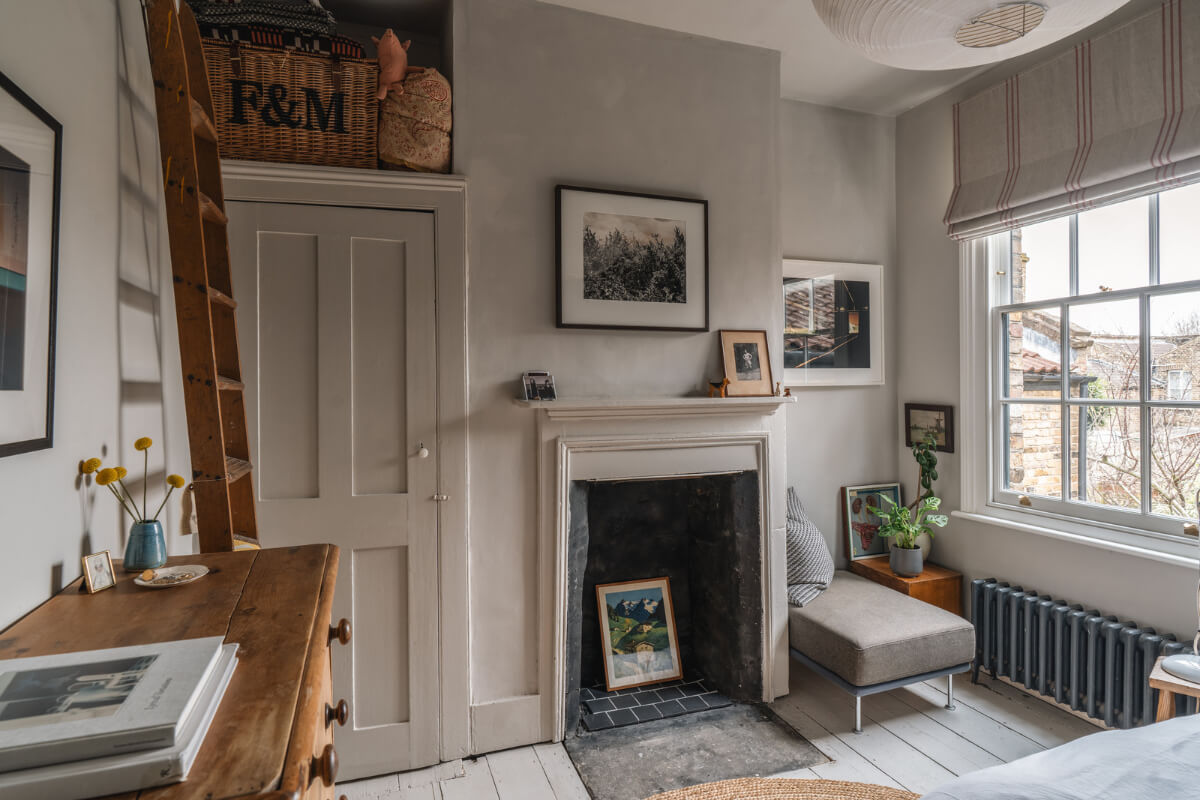A Cozy Victorian Home Painted in Moody Blue and Gray Tones 20 bedroom gray walls rustic floorboards