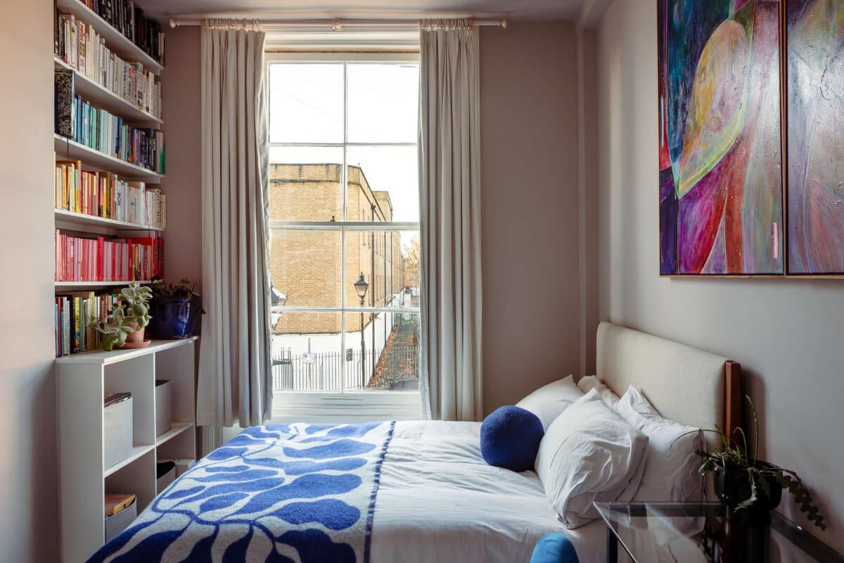 A Corner Apartment with Large Windows in a Former London Pub 13 bedroom large window bookshelves