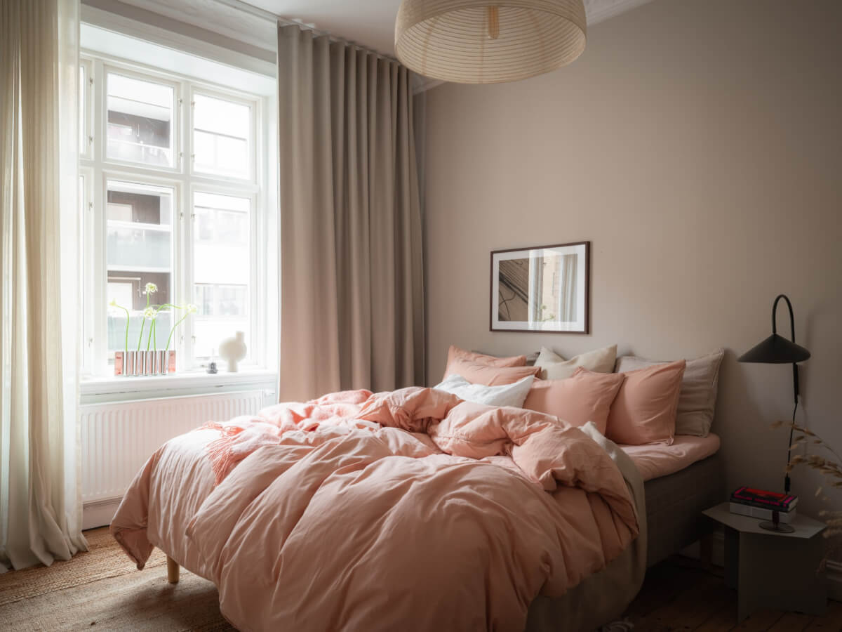 A Calm Color Palette in a Charming Swedish Apartment 18 bedroom pink bedding