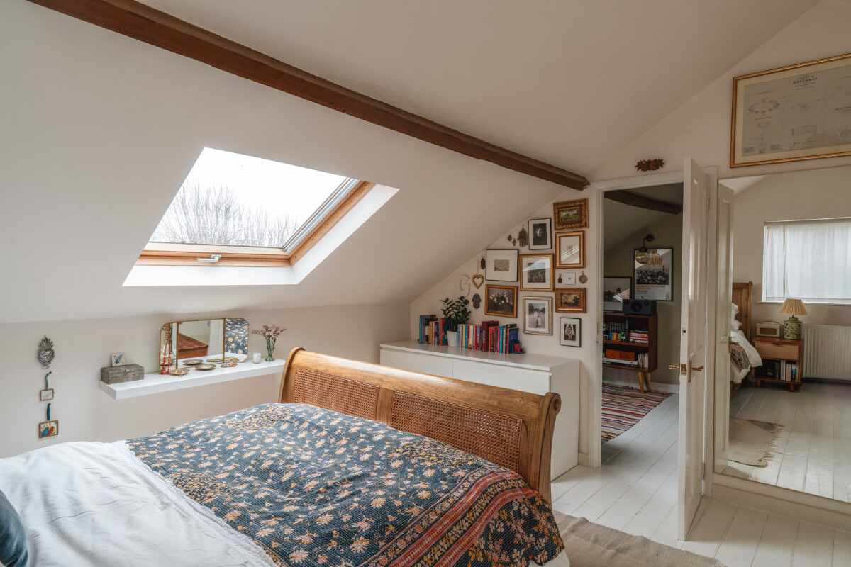 A Cozy Two-Bedroom Attic Apartment in a Victorian Townhouse 17 bedroom slanted ceiling white floorboards
