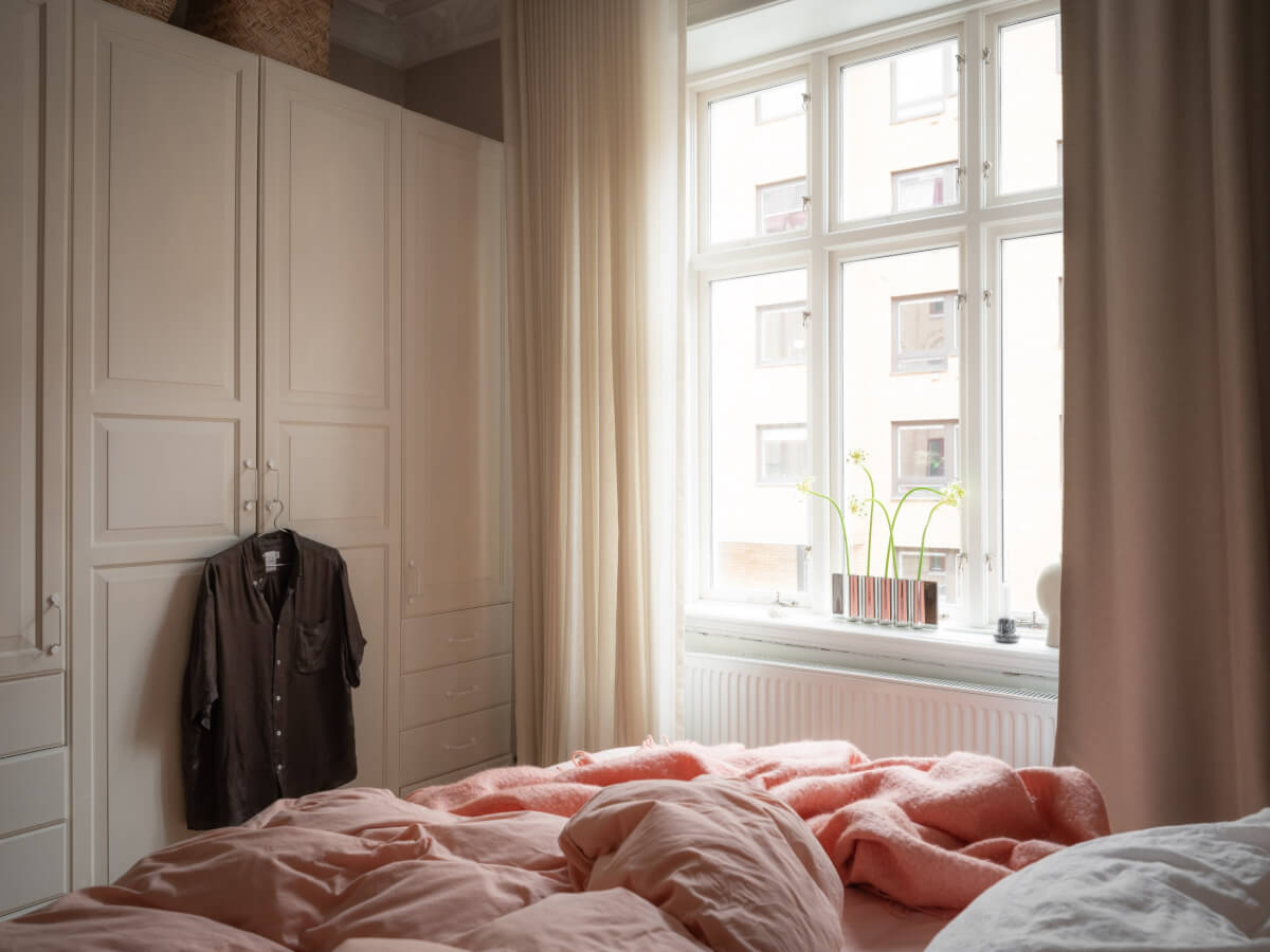 A Calm Color Palette in a Charming Swedish Apartment 21 bedroom wardrobes