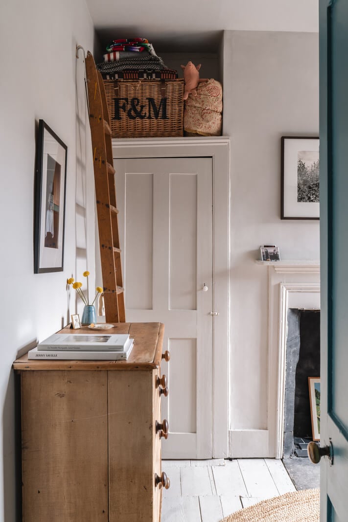 A Cozy Victorian Home Painted in Moody Blue and Gray Tones 21 bedroom white floorboards