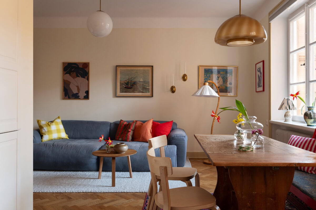 A Swedish Apartment with Period Features and Charming Color Pops 6 beige-yellow walls living room