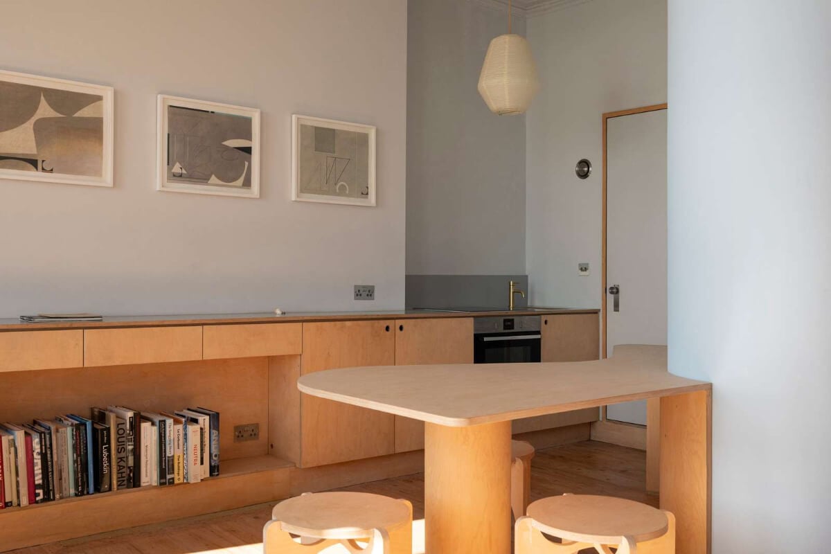 Bespoke Furniture in a Restored Seaside Apartment in England 7 birch ply kitchen curved table
