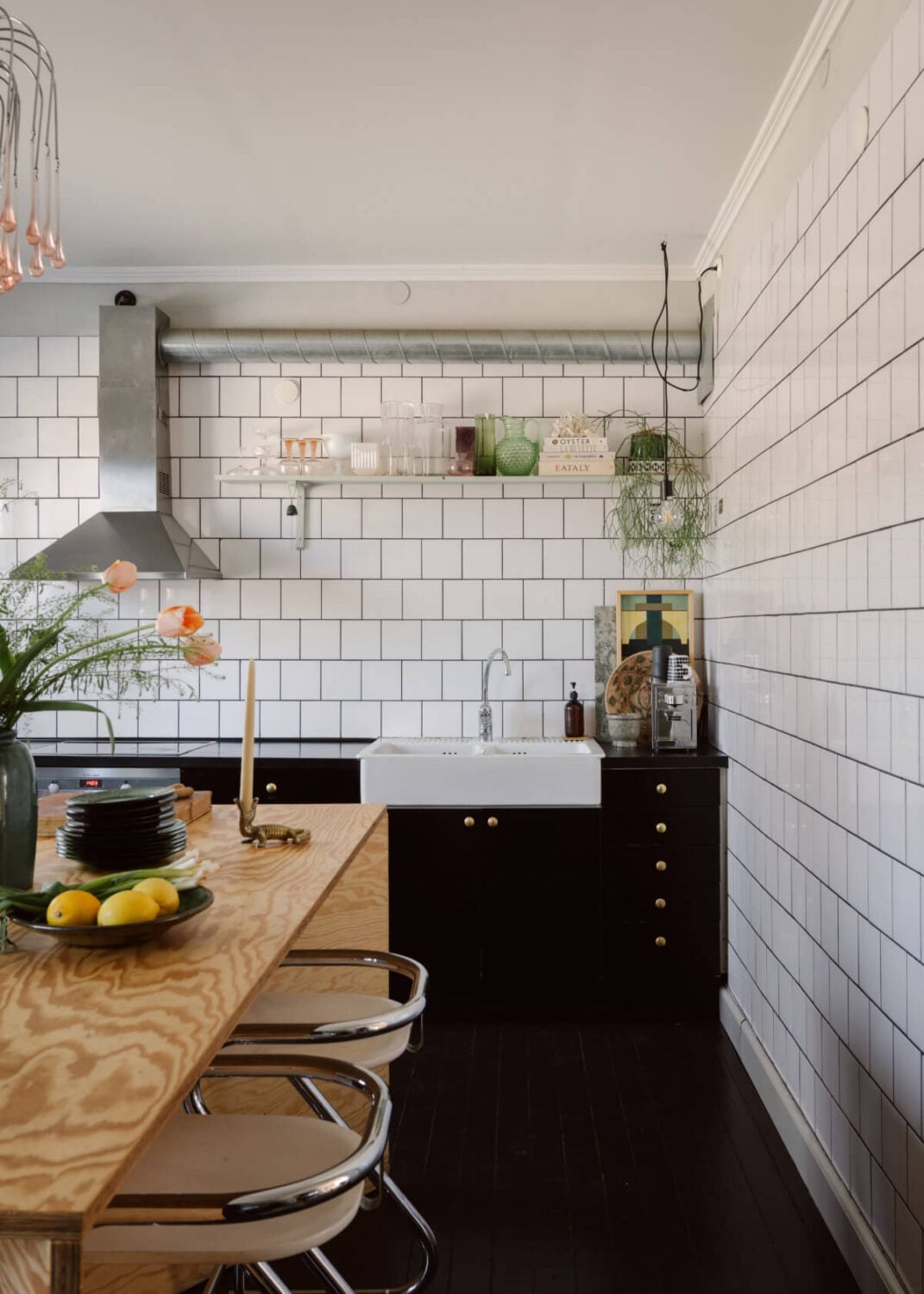 An Amazing Swedish House with Pink and Gray Rooms 10 black and white kitchen