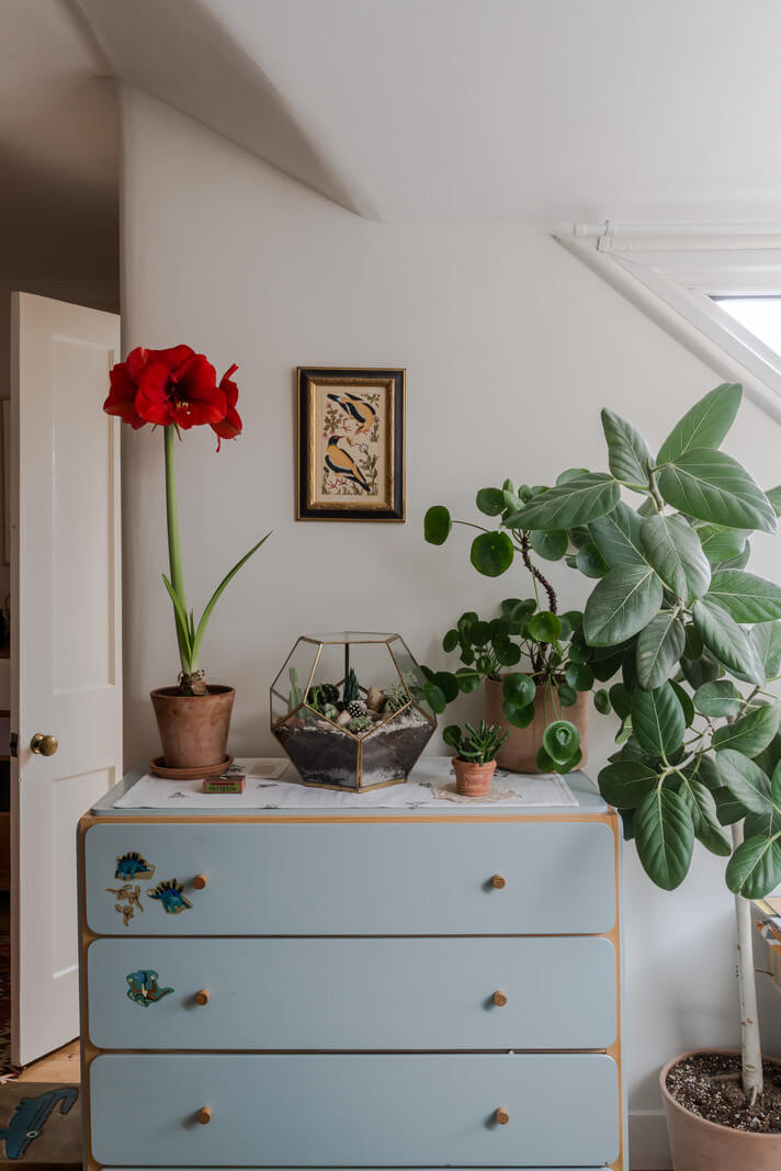 A Light-Filled London Attic Apartment with Cozy Nooks 10 blue cabinet A Light-Filled London Attic Apartment with Cozy Nooks