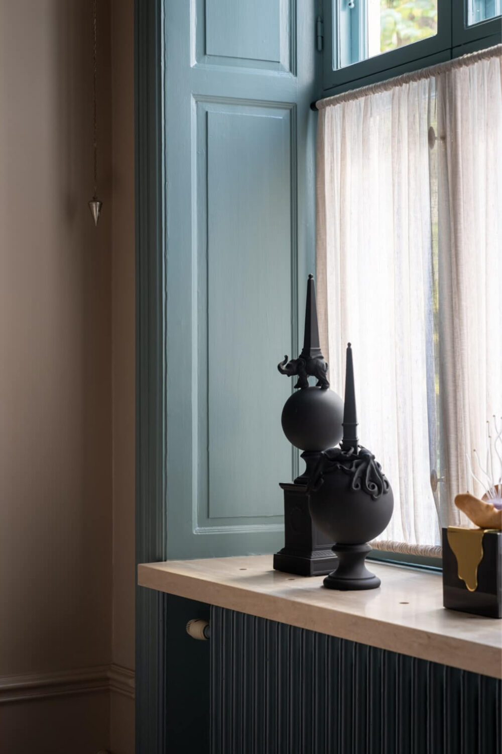 Hotel-Style Interiors in a Late 19th Century Apartment in Stockholm 17 blue joinery