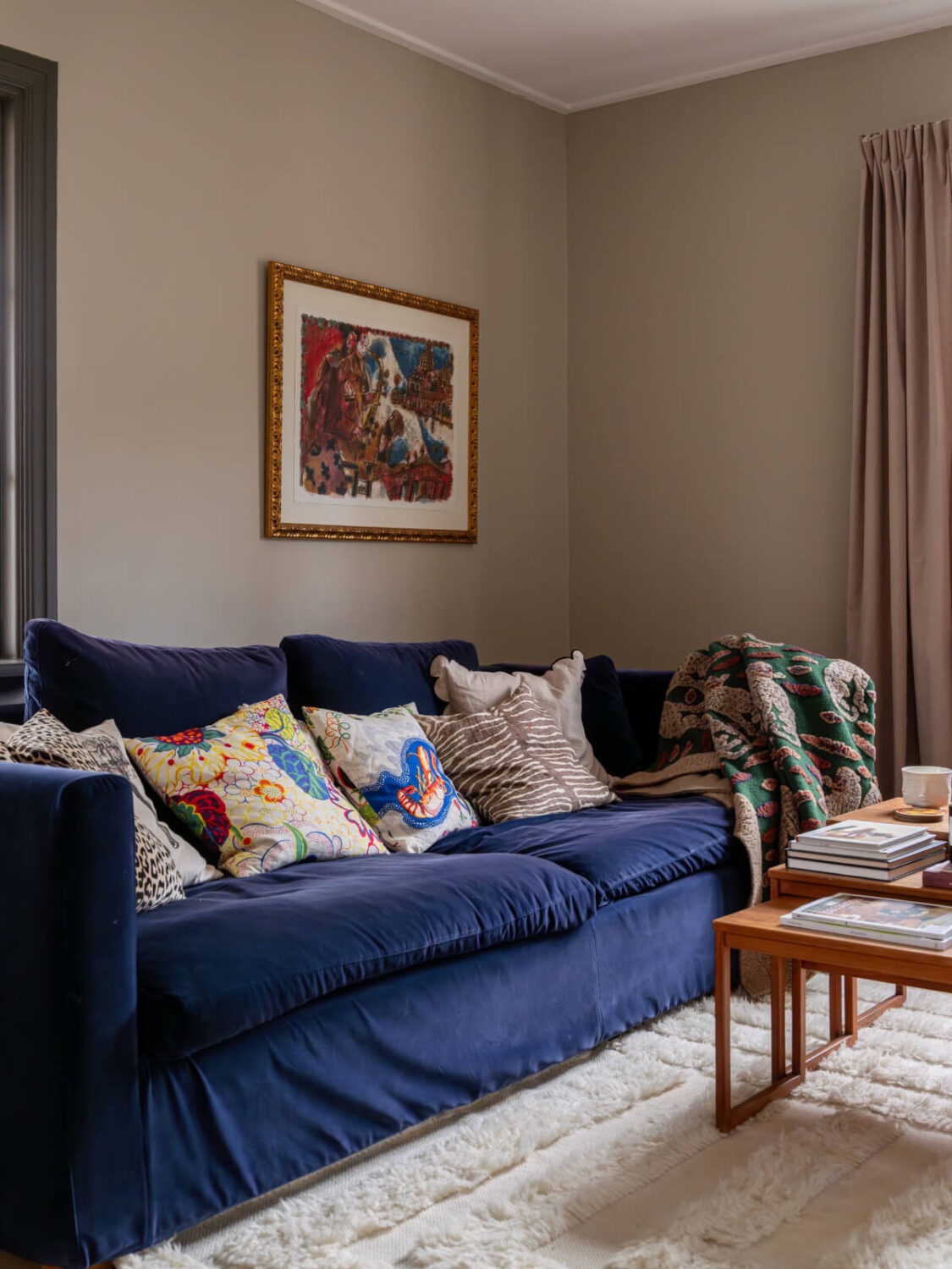 A Beautiful Renovated Family Home with a Charming Garden 3 blue living room sofa