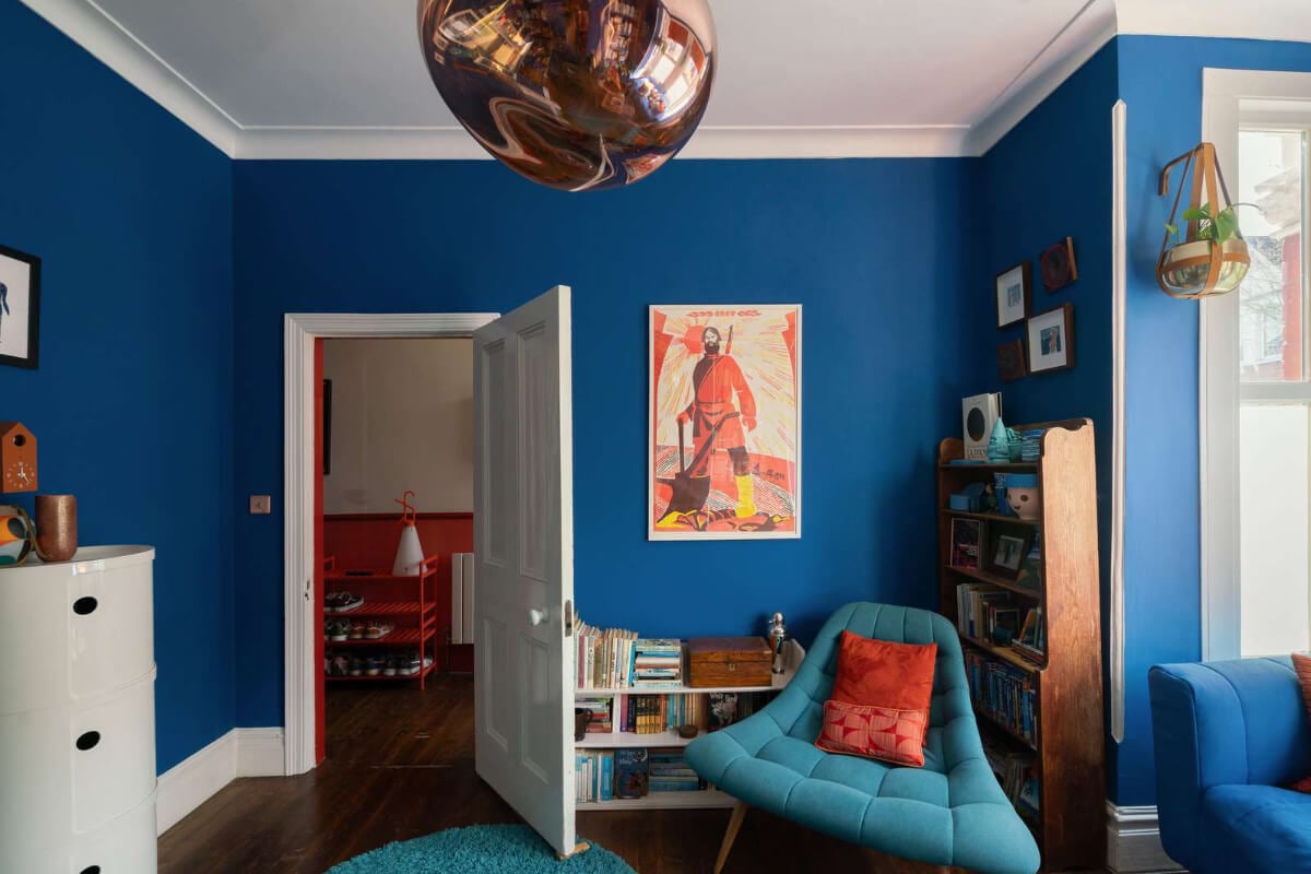 A Colorful Home with a Gold Extension in North London 11 blue living room