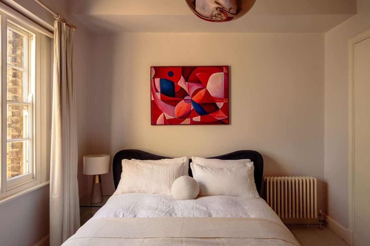 A Corner Apartment with Large Windows in a Former London Pub 12 blue velvet wavy headboard