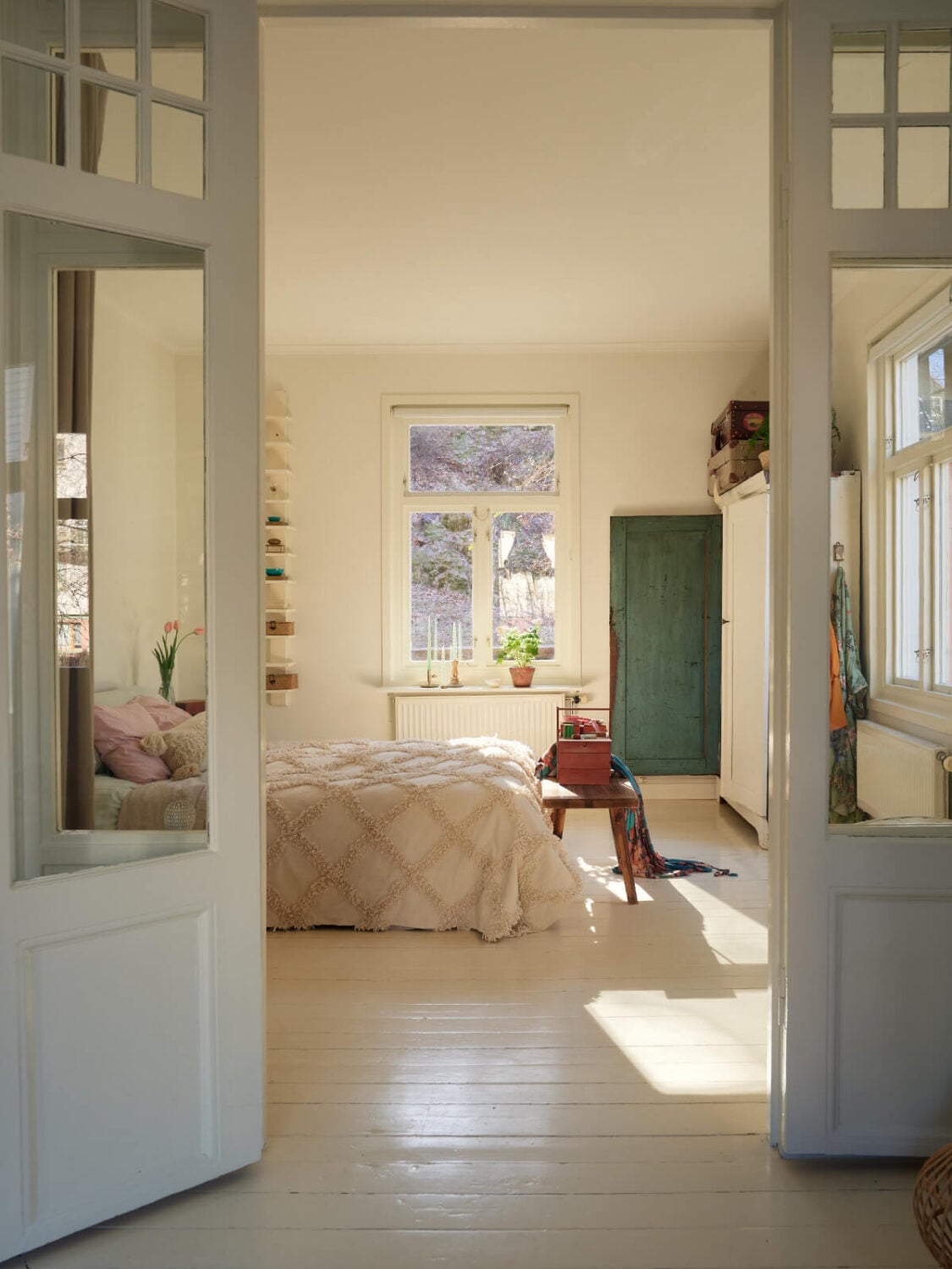 Light-Filled Rooms and a Charming Veranda in a Swedish Apartment 18 bright white bedroom