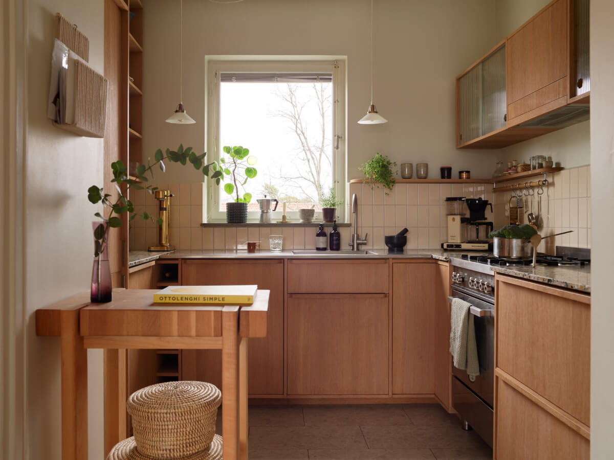 A Renovated 1940s Apartment with Colorful Bedrooms 10 brushed oak veneer kitchen cabinets