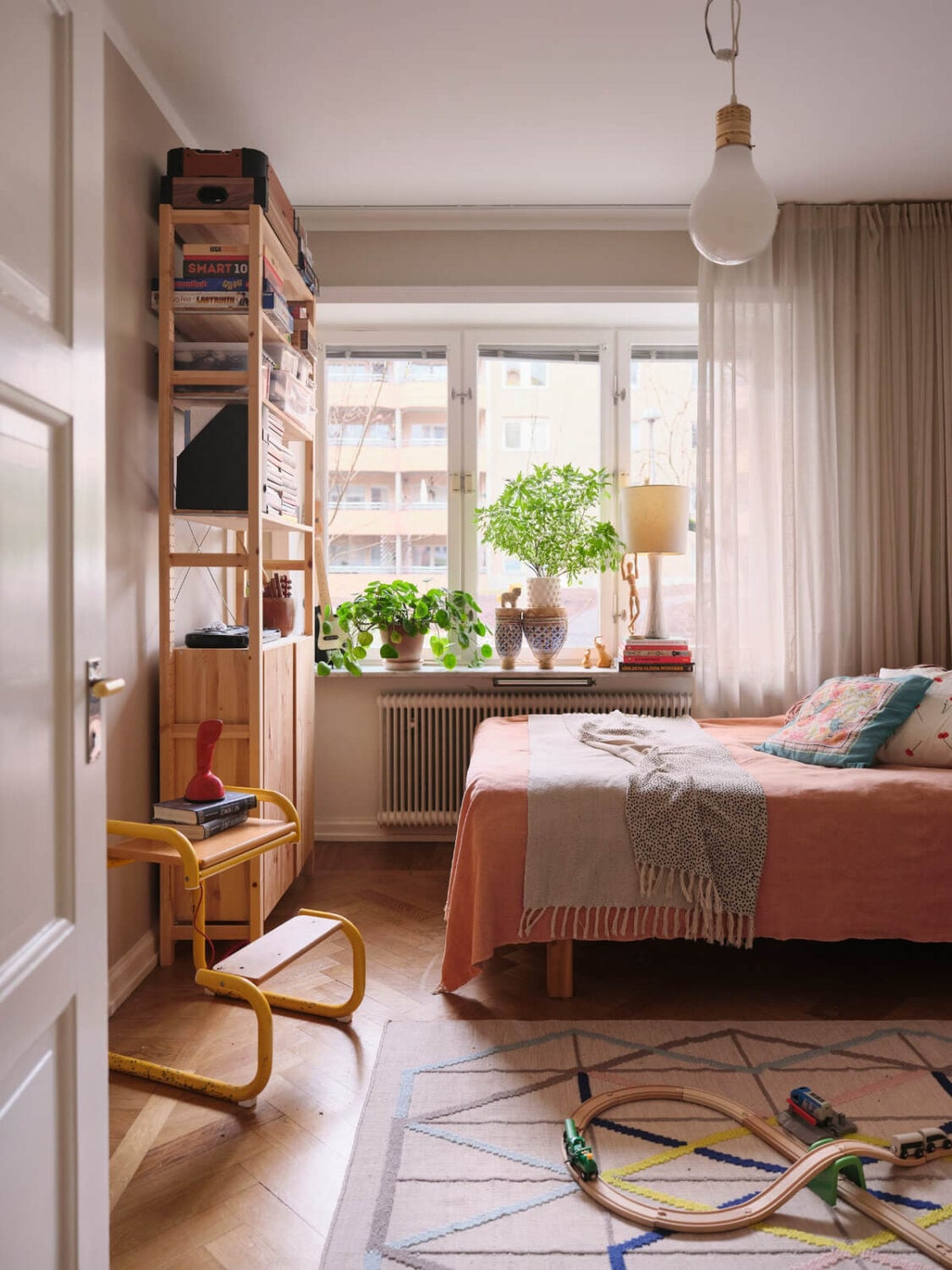 A Corner Apartment with Period Features and Bright Color Pops 17 childrens bedroom