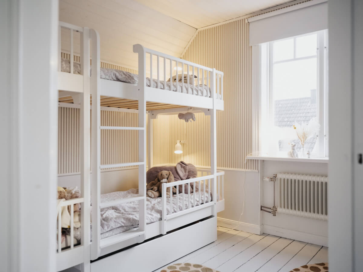 Light-Filled Rooms in a Charming 1907 Swedish Villa 26 childrens bedroom striped wallpaper bunk bed