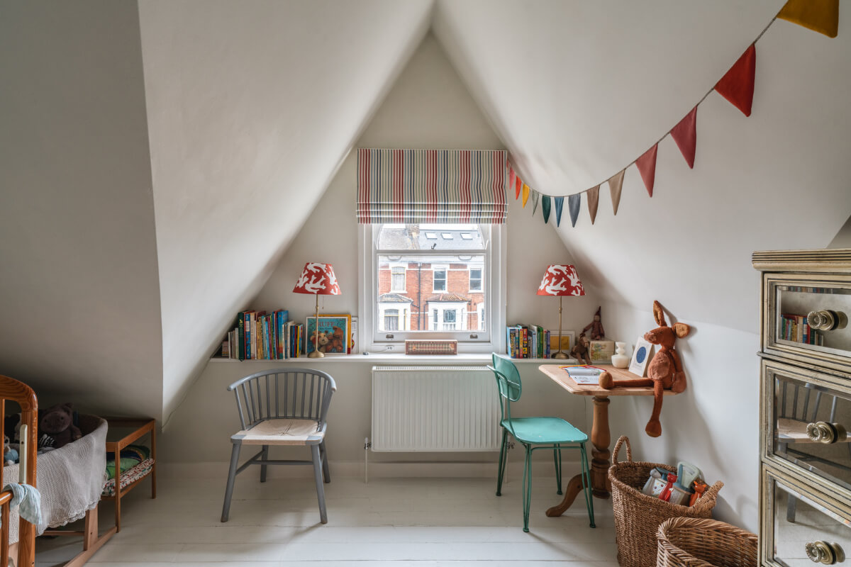 A Cozy Two-Bedroom Attic Apartment in a Victorian Townhouse 12 childrens room white floorboards slanted ceilings