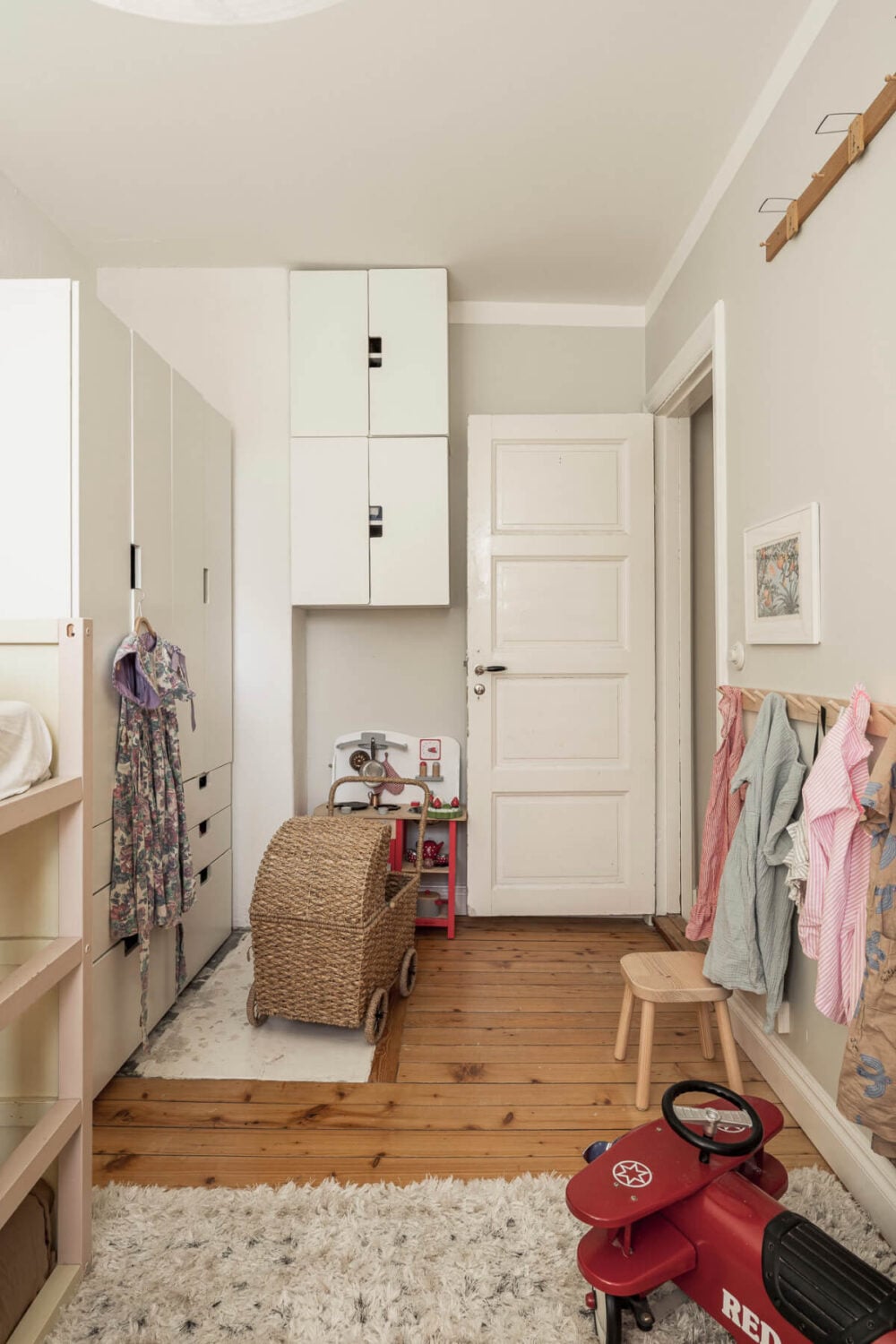A Swedish Duplex Apartment Inspired by A Danish Summer House 38 childrens-room-with-large-wardrobes