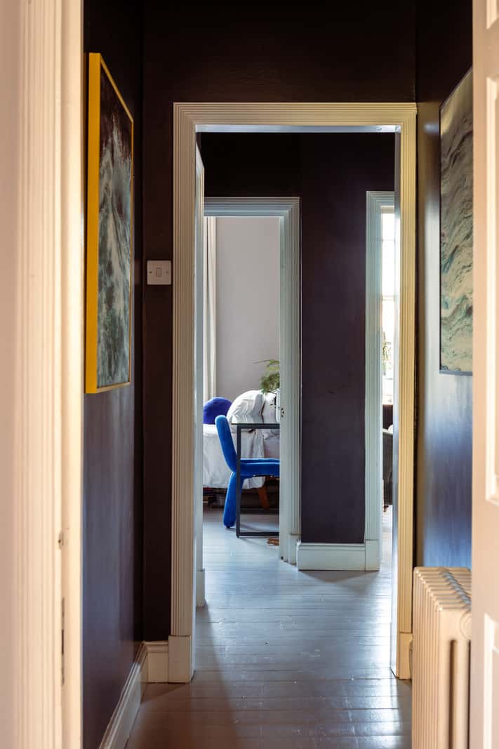 A Corner Apartment with Large Windows in a Former London Pub 16 dark blue hall