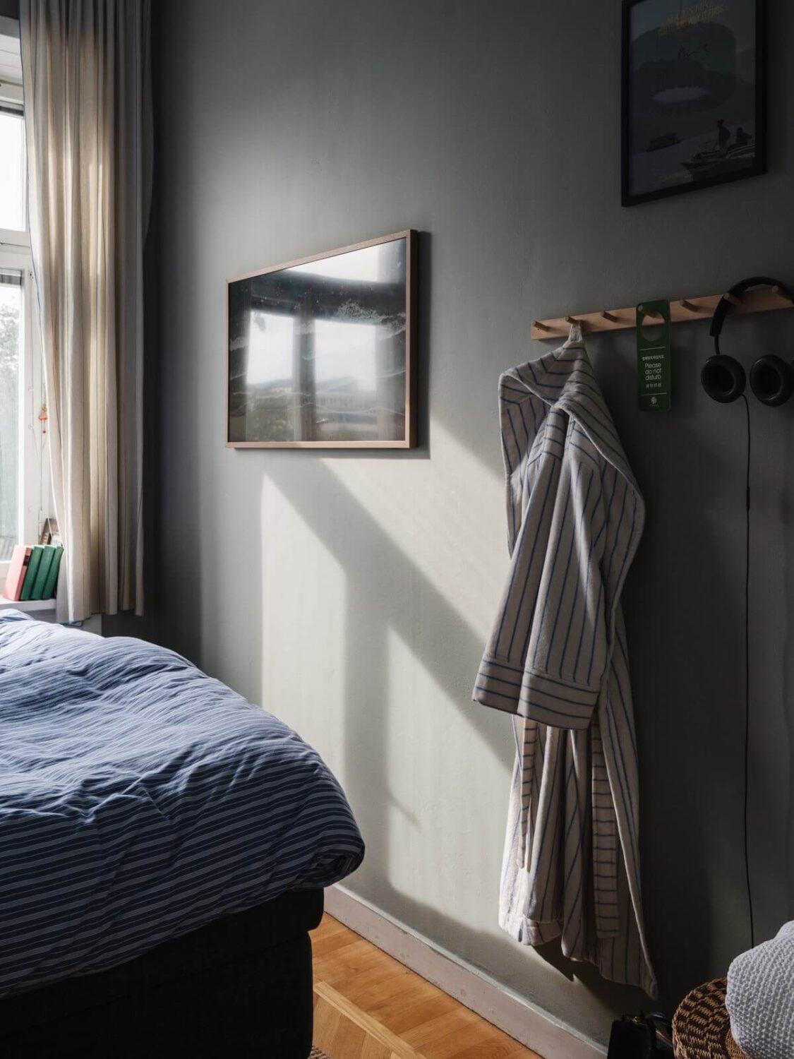 Gray Tones and Built-in Storage in a Charming Corner Apartment 15 dark gray bedroom