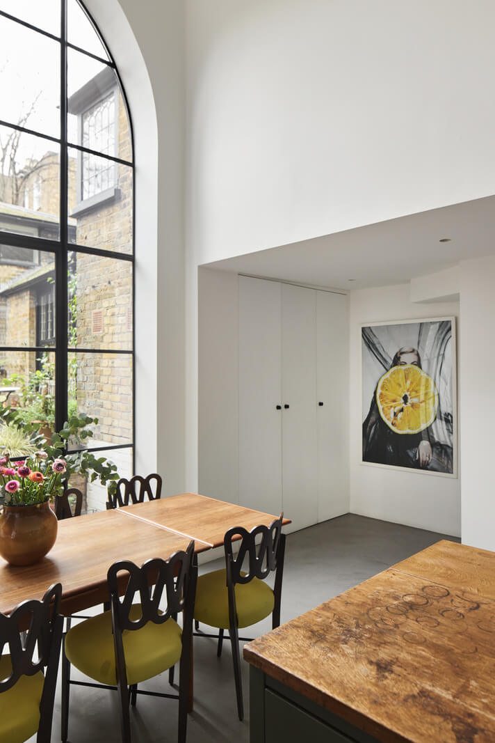 An Early Victorian House with a Unique Barrel-Vaulted Artist's Studio 4 dining area in front of large window