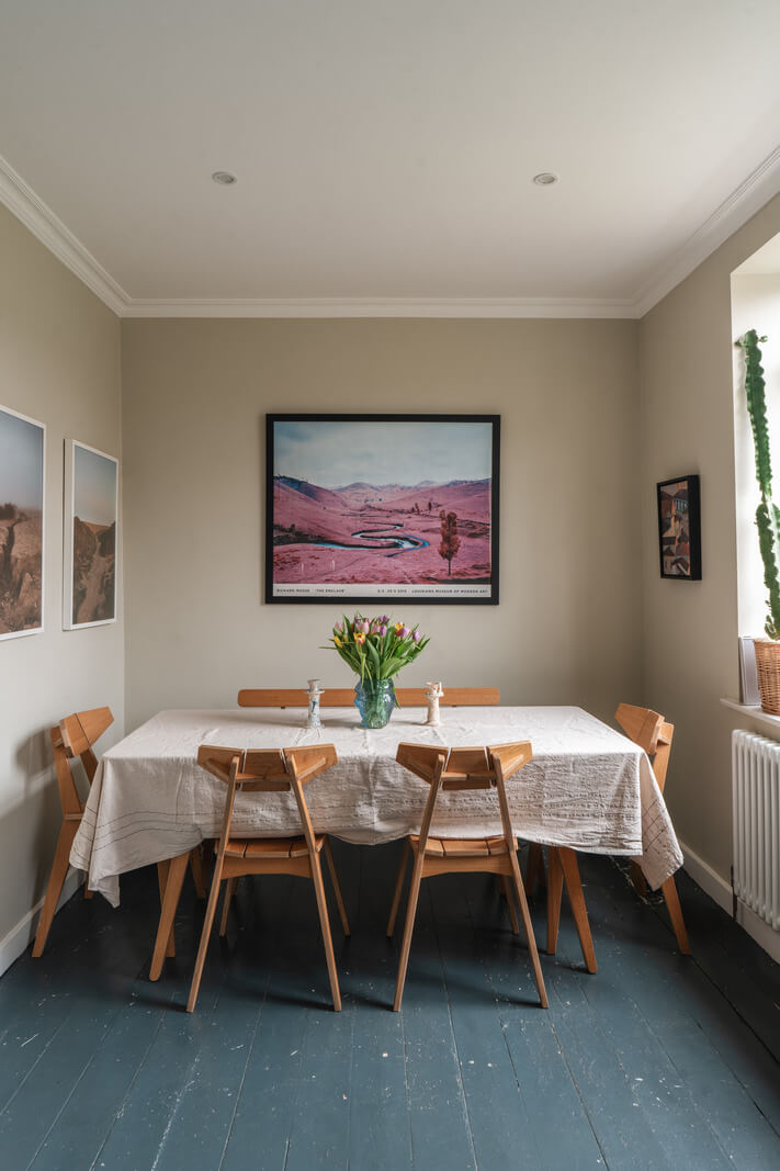 A Cozy Two-Bedroom Attic Apartment in a Victorian Townhouse 8 dining room painted floorboards beige walls