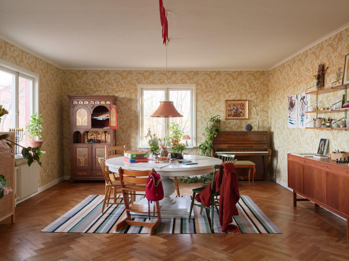 A Grand Family Home in a Former Swedish Doctor's Villa 7 dining room wallpaper large round table