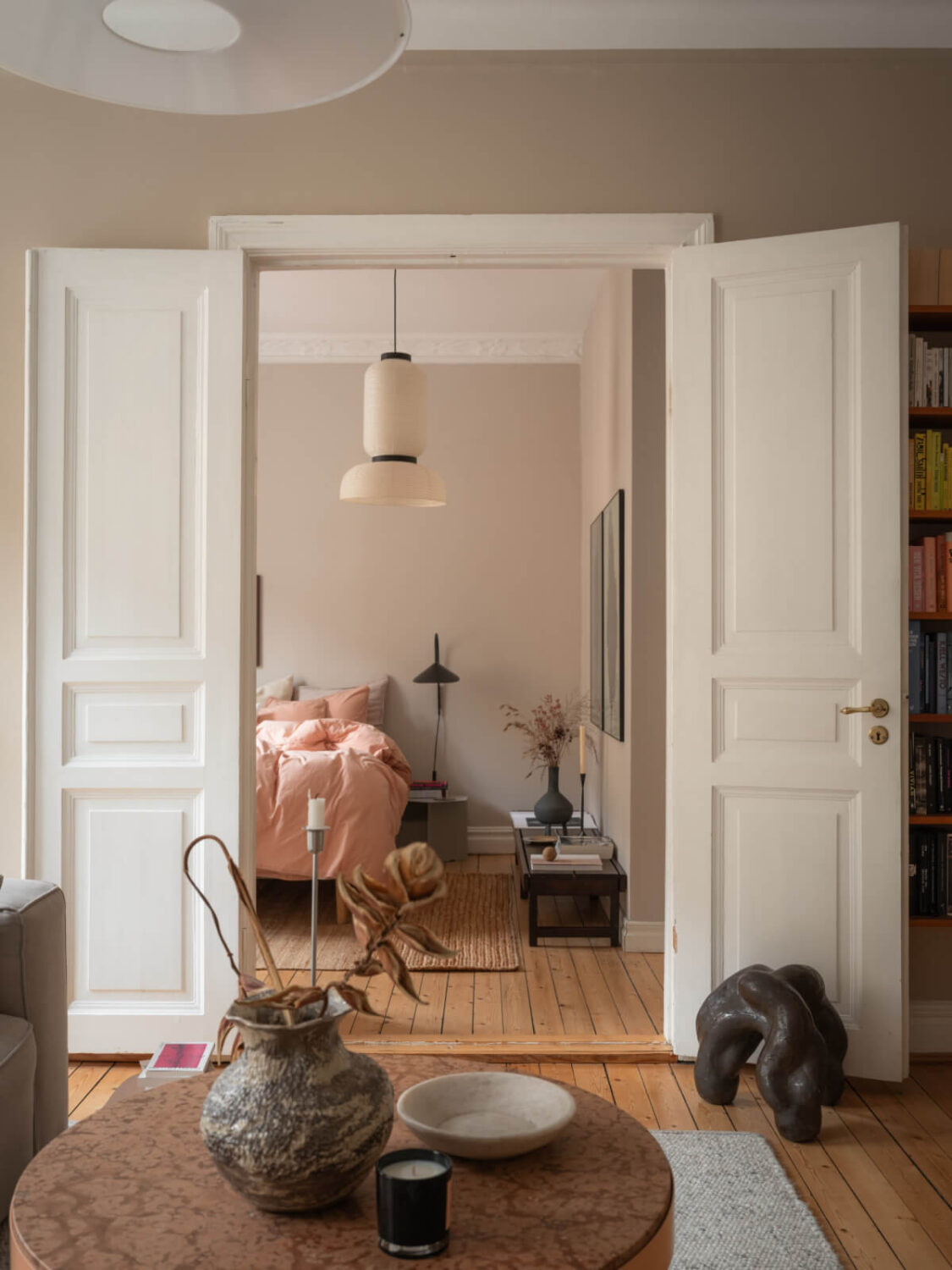 A Calm Color Palette in a Charming Swedish Apartment 17 double doors bedroom