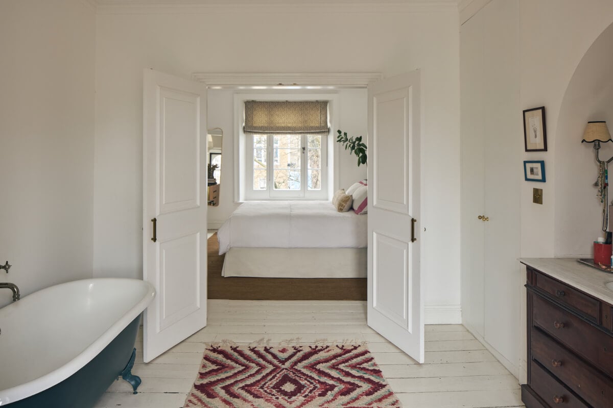 An Early Victorian House with a Unique Barrel-Vaulted Artist's Studio 14 en-suite bathroom white wooden floorboards freestanding bath