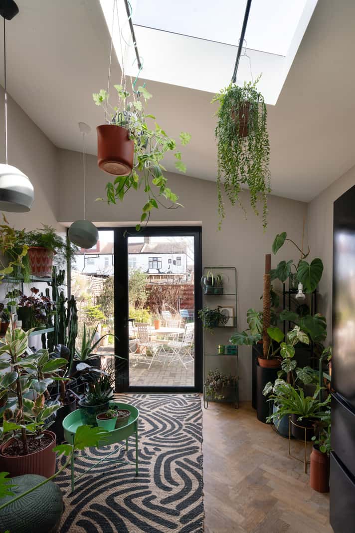 A Colorful Home with a Gold Extension in North London 4 extension garden room skylight