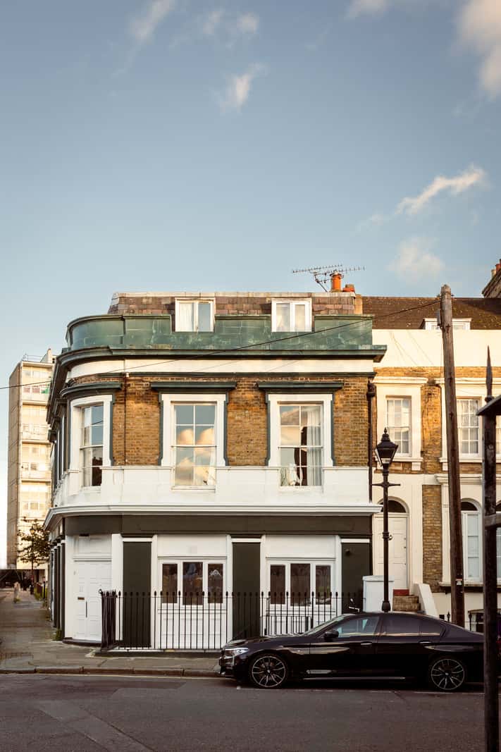 A Corner Apartment with Large Windows in a Former London Pub 21 exterior london apartment
