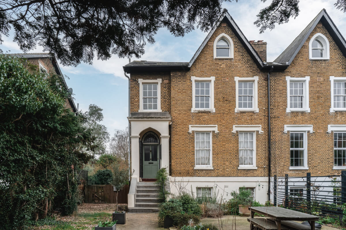 A Cozy Two-Bedroom Attic Apartment in a Victorian Townhouse 22 exterior victorian house