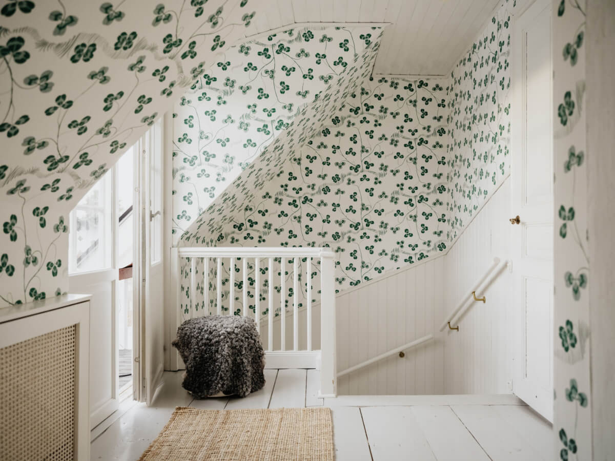 Light-Filled Rooms in a Charming 1907 Swedish Villa 22 first floor landing josef frank kloverblad wallpaper