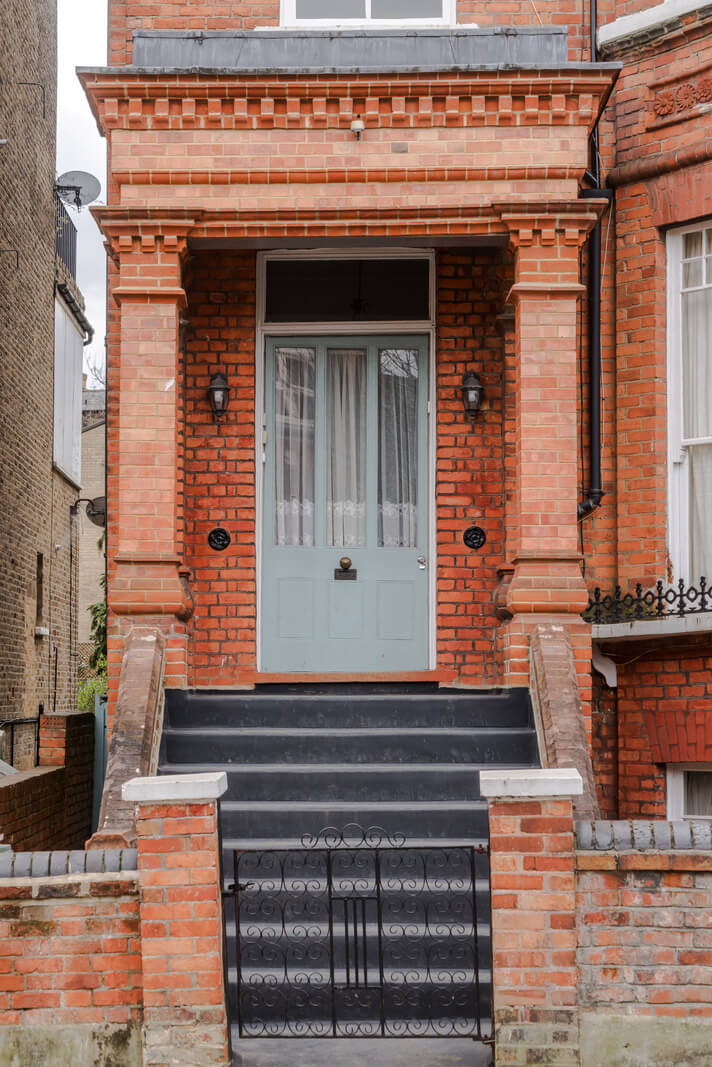 A Light-Filled London Attic Apartment with Cozy Nooks 22 front door london apartment