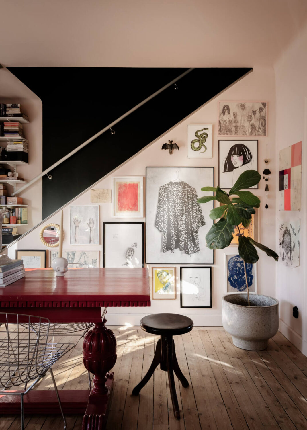 An Amazing Swedish House with Pink and Gray Rooms 6 gallery wall staircase