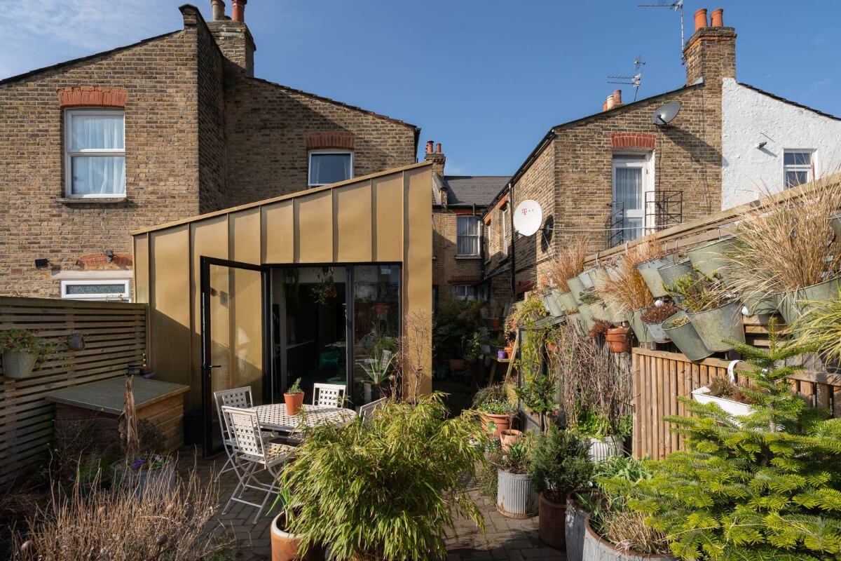 A Colorful Home with a Gold Extension in North London 25 garden and modern extension