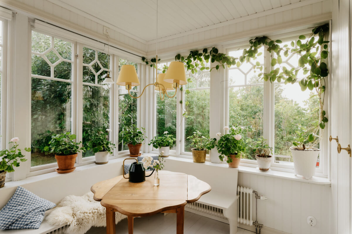 Light-Filled Rooms in a Charming 1907 Swedish Villa 4 garden room built-in bench