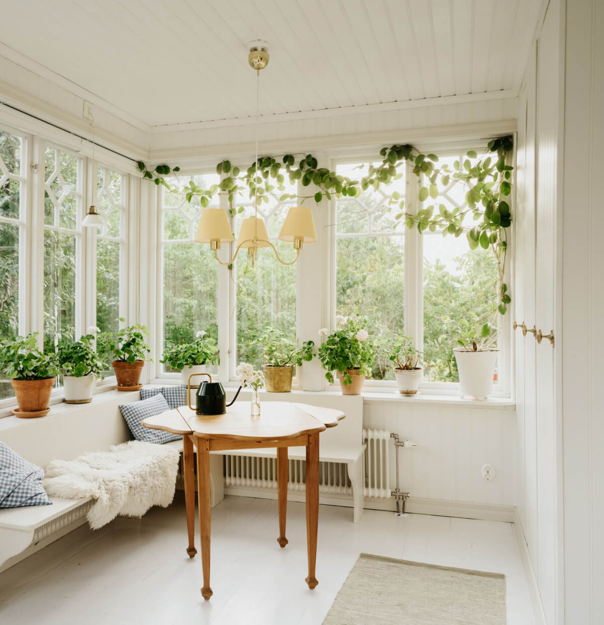Light-Filled Rooms in a Charming 1907 Swedish Villa 3 garden room large windows