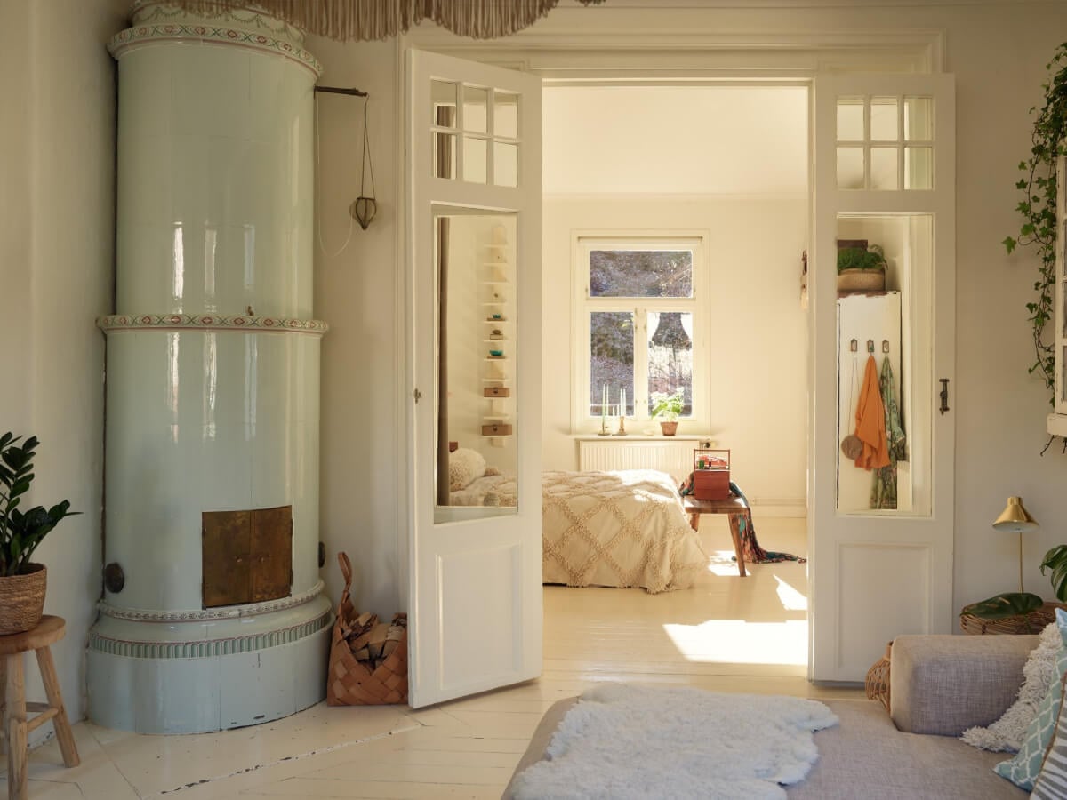 Light-Filled Rooms and a Charming Veranda in a Swedish Apartment 5 glass doors to bedroom