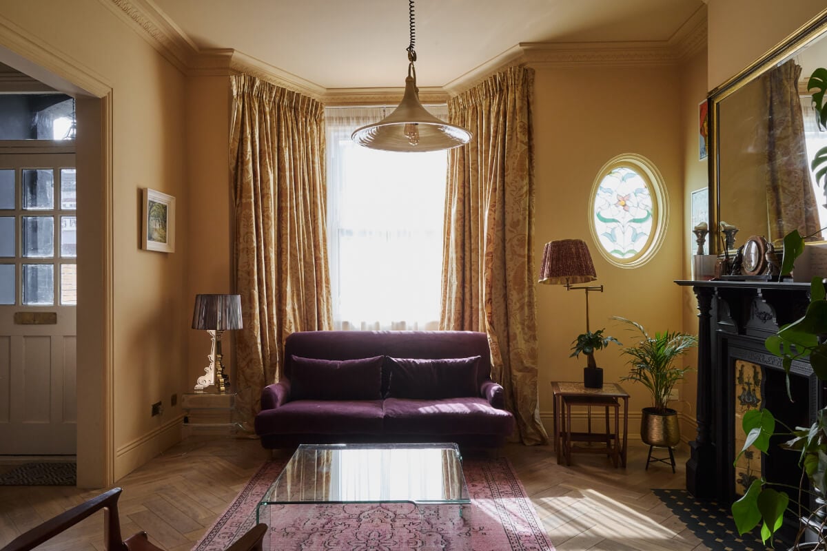 A Beautiful Extended Edwardian House Blends Period Features with Modern Design 2 golden yellow living room bay window