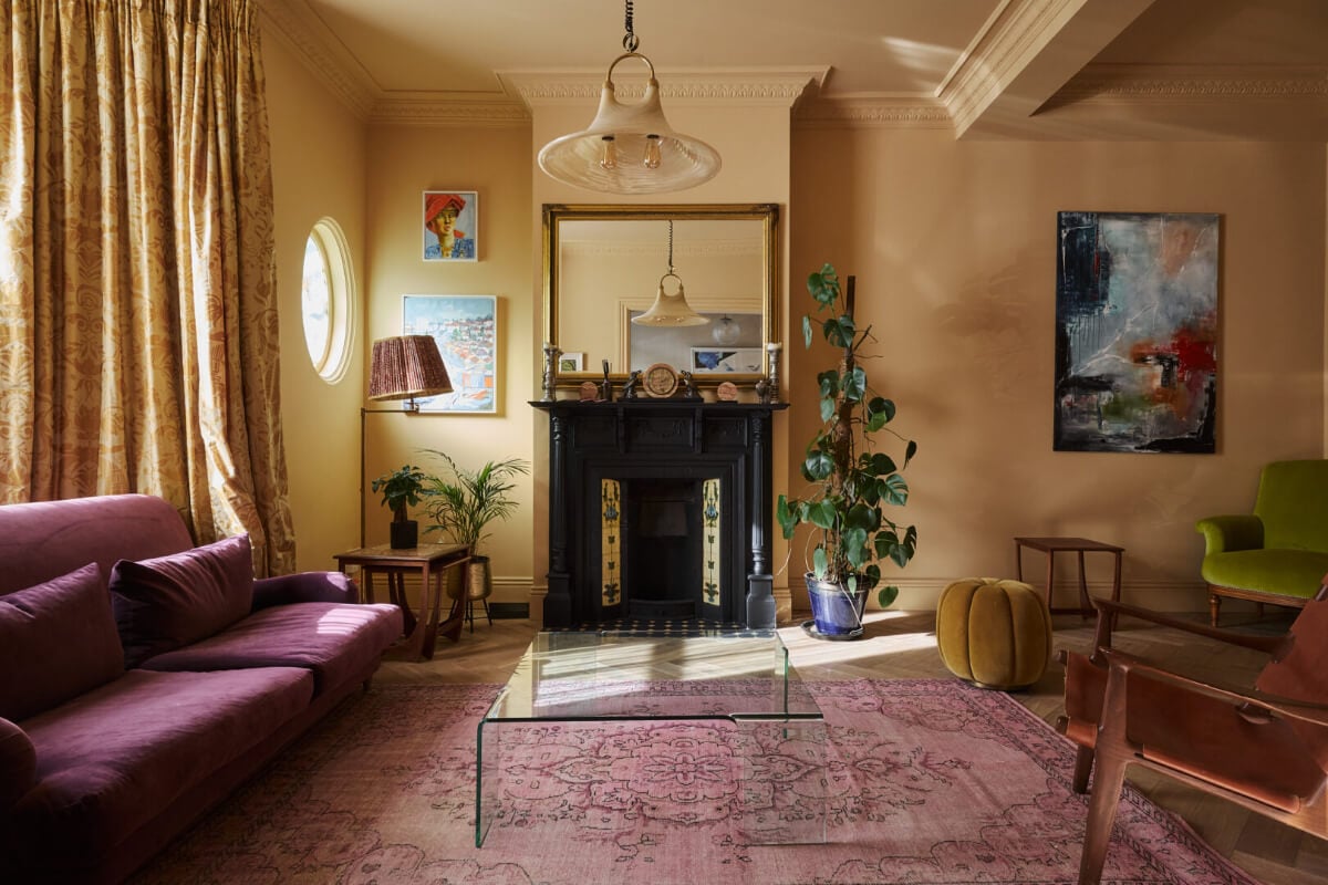 golden yellow living room fireplace period details