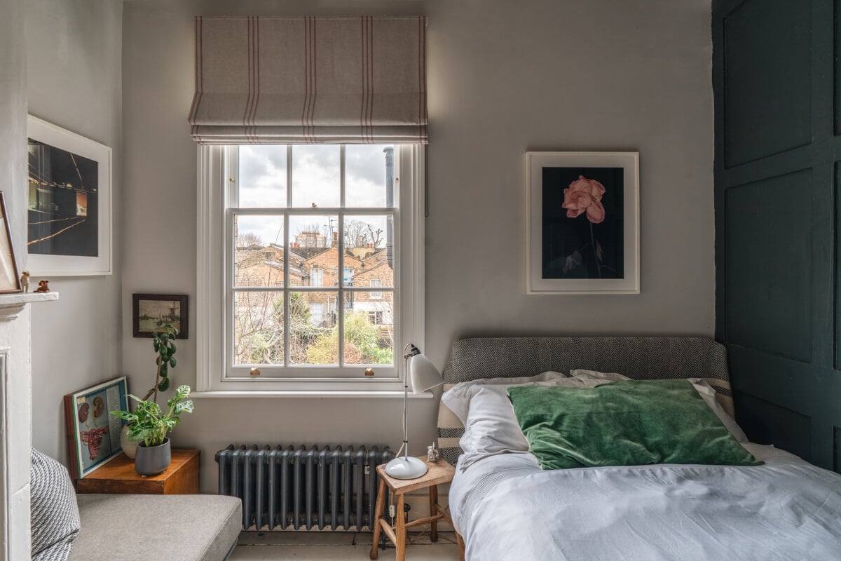 A Cozy Victorian Home Painted in Moody Blue and Gray Tones 23 gray bedroom large window