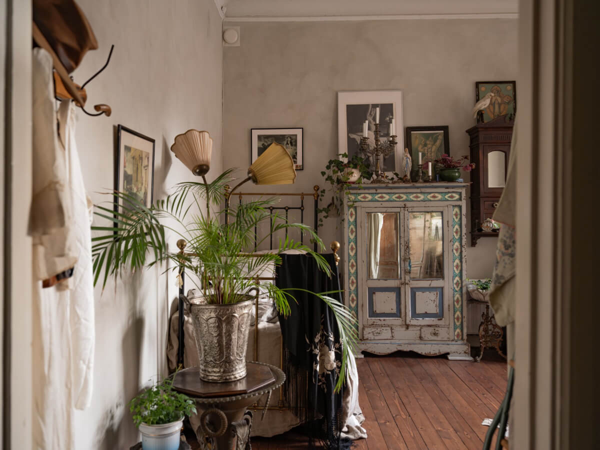 Time Has Stood Still in This Stockholm Studio Apartment 9 gray studio wooden floor antique furniture