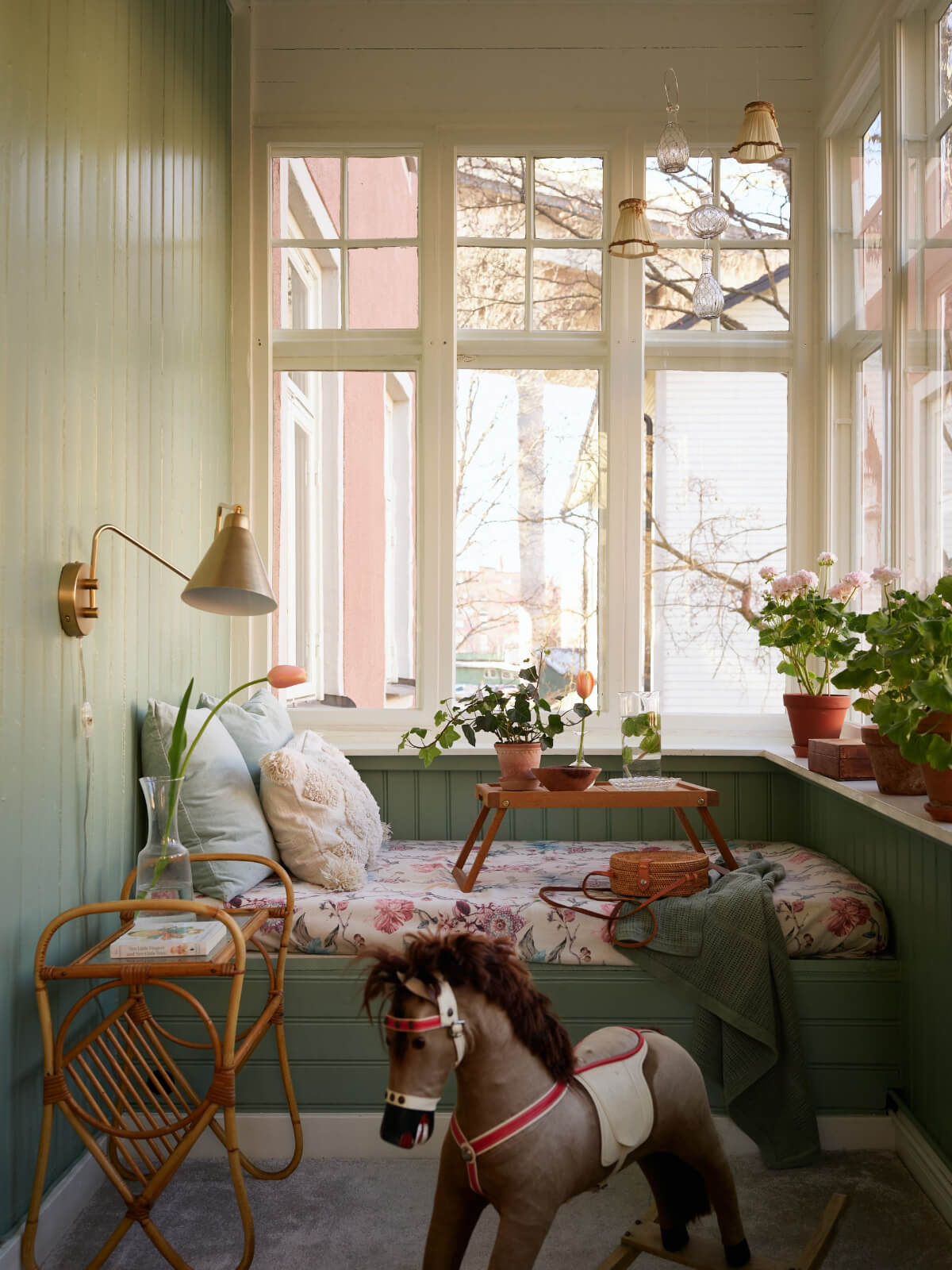 green paneled garden room window seat