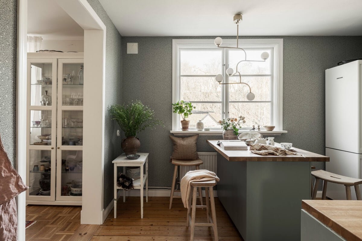 A Swedish Duplex Apartment Inspired by A Danish Summer House 23 green wallpaper kitchen
