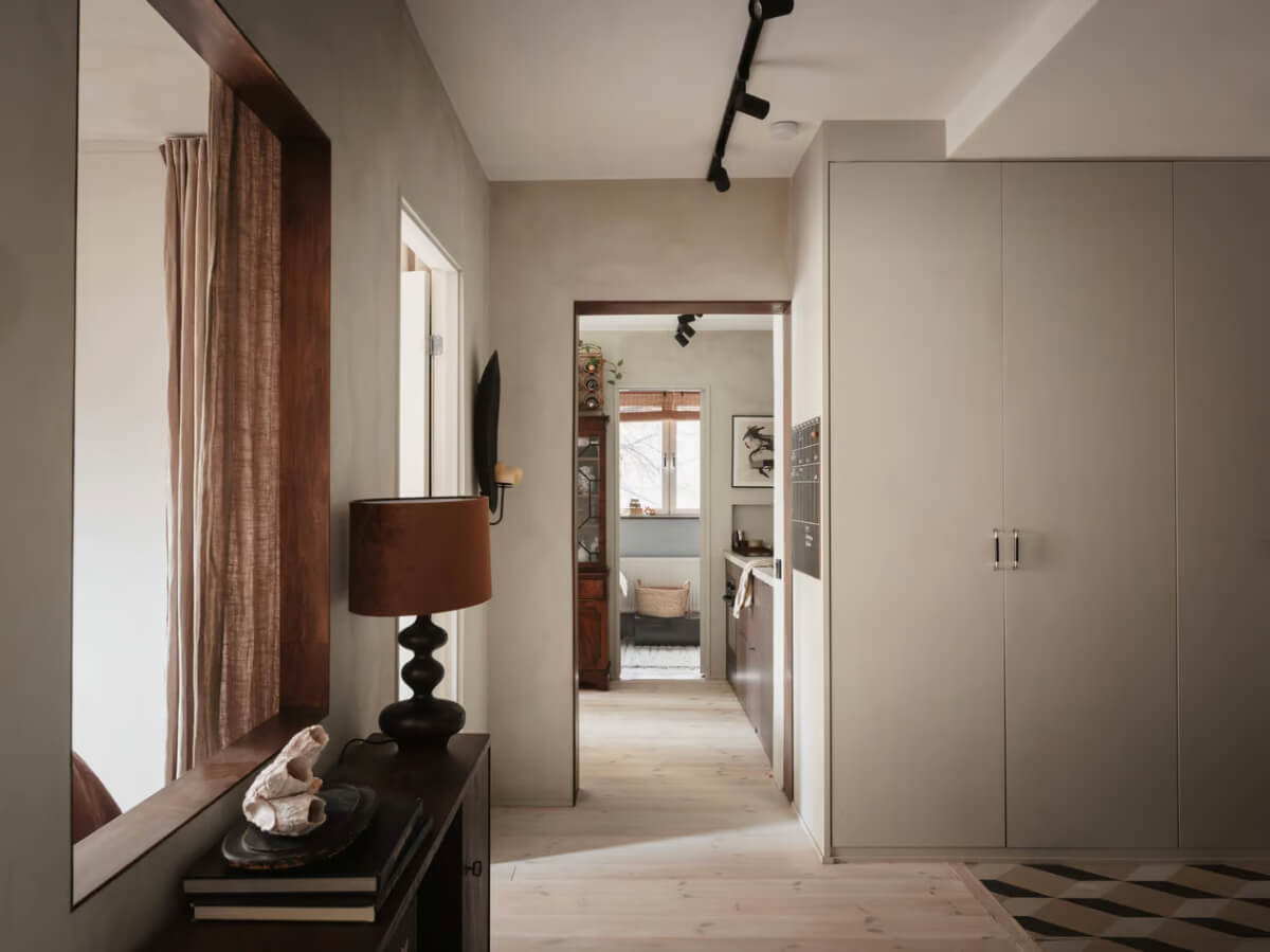 Limewash Walls in Muted Tones in a Swedish Apartment 26 hall built-in wardrobes