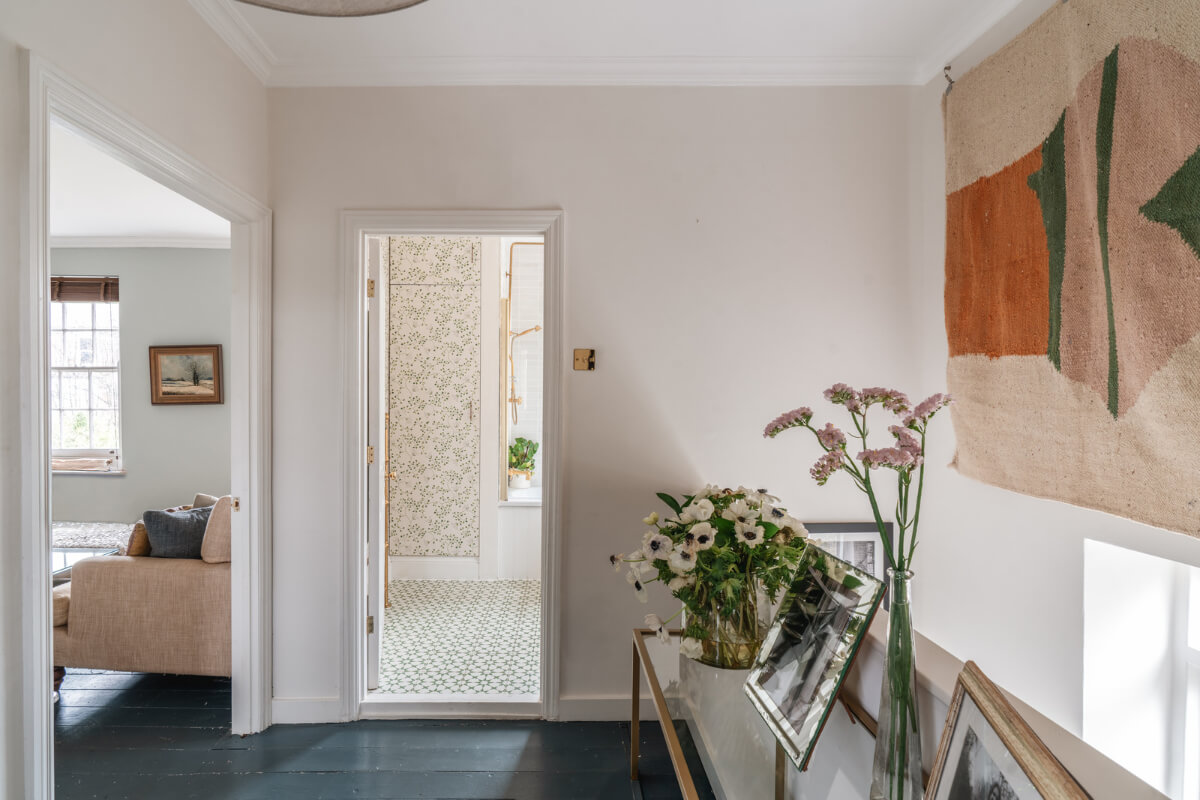 A Cozy Two-Bedroom Attic Apartment in a Victorian Townhouse 11 hall dark painted floorboards