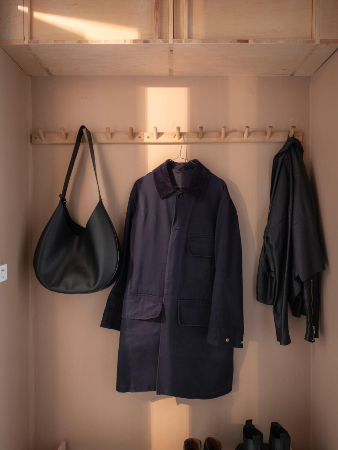 A Calm Color Palette in a Charming Swedish Apartment 23 hall storage
