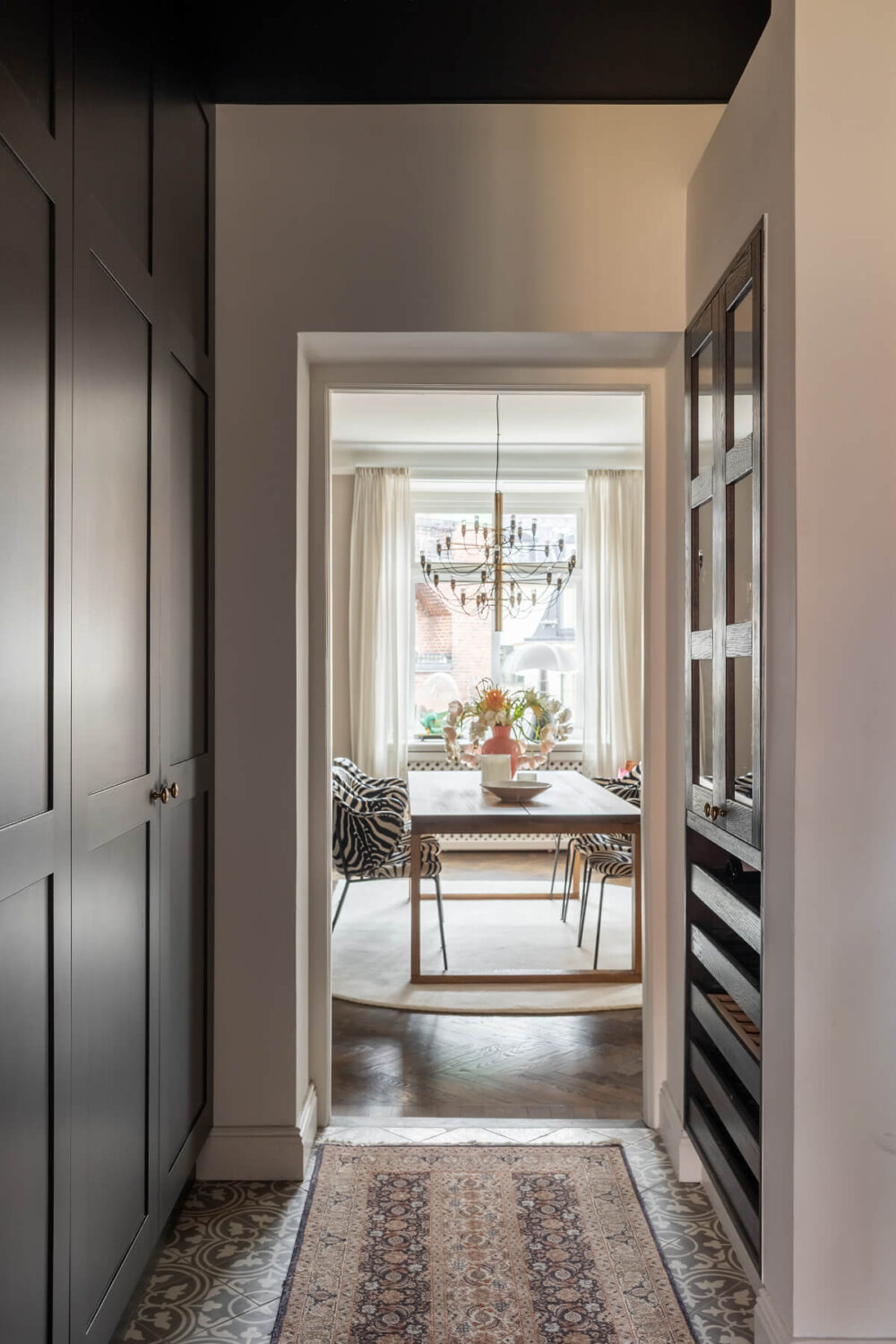A Red Kitchen in a Grand Swedish Corner Apartment 9 hall with built-in cabinets