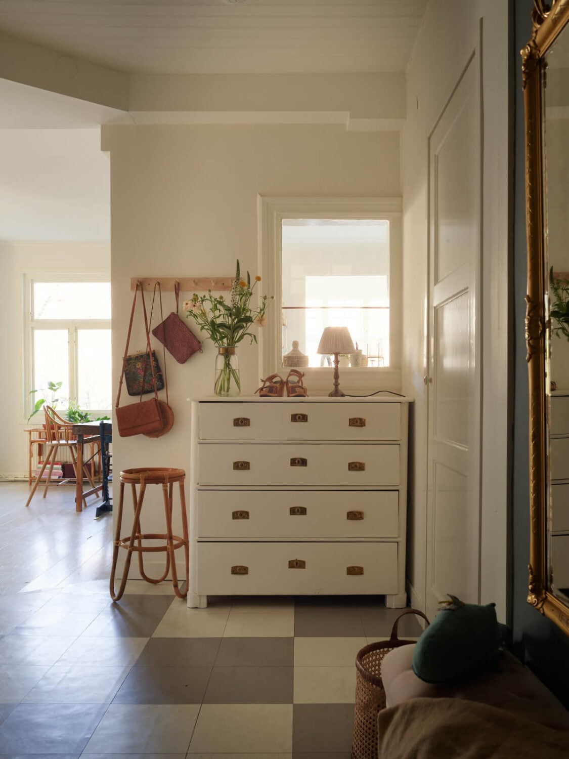Light-Filled Rooms and a Charming Veranda in a Swedish Apartment 25 hall wooden floorboards in checkerboard pattern