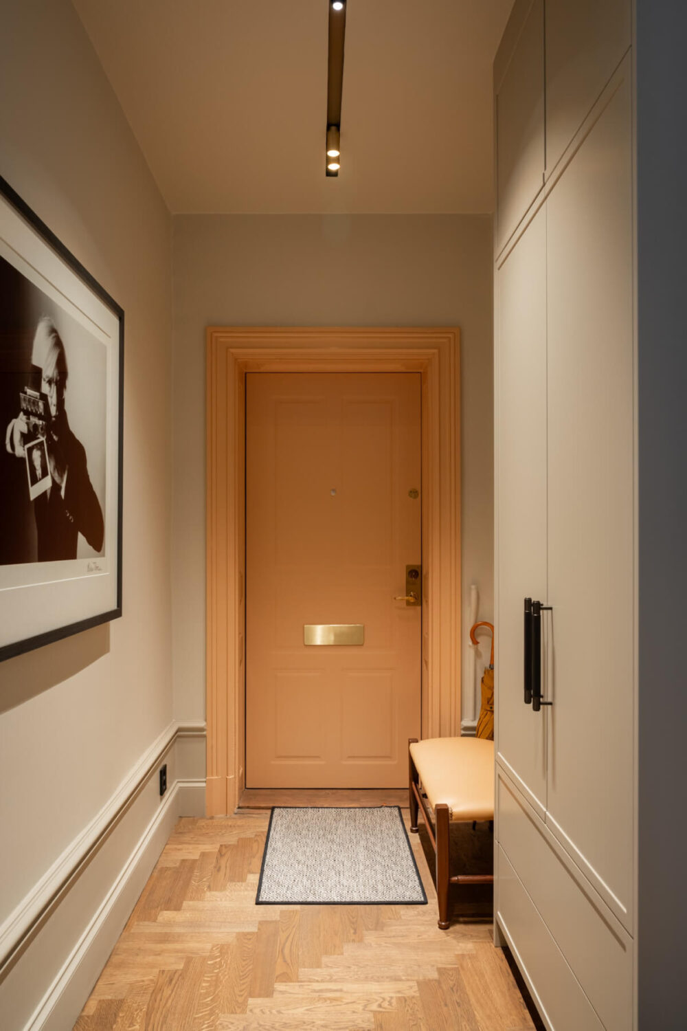 Hotel-Style Interiors in a Late 19th Century Apartment in Stockholm 21 hallway floor to ceiling wardrobes Hotel-Style Interiors in a Late 19th Century Apartment in Stockholm